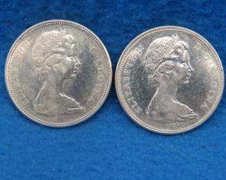 Lot 204. Two 1967 Canadian silver dollars
