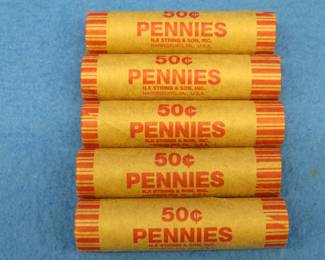 Lot 79. Five machine wrapped rolls of Lincoln wheat pennies.  250 total pennies.