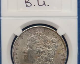 Lot 243. 1889 P Morgan silver dollar B.U.