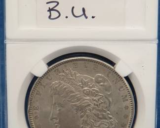 Lot 242. 1889 P Morgan silver dollar B.U.