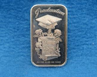 Lot 176. 1973 Graduation silver bar.  One ounce of .999 fine silver.