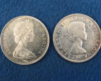 Lot 144. Two 80% silver Canadian dollars