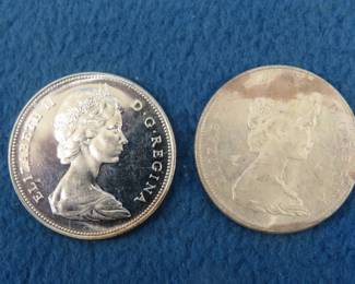 Lot 116. Two Canadian 80% Silver dollars