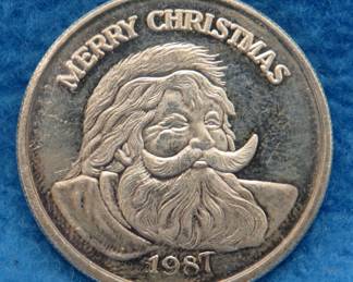 Lot 158. 1987 Santa silver coin.  One ounce of .999 silver