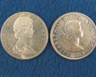 Lot 324. Two 80% silver Canadian dollars