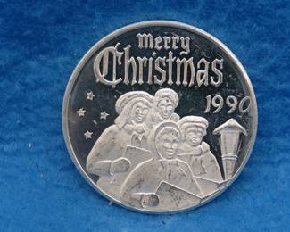 Lot 298. 1990 art round.  One ounce of .999 fine silver.