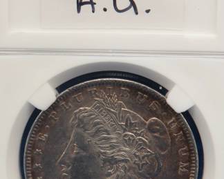 Lot 283. 1897 P Morgan silver dollar.  A.U.