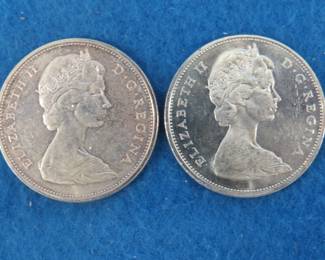 Lot 184. Two 1965 Canadian silver dollars