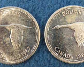 Lot 113. Two 1967 Canadian Goose silver dollars.  80% silver.