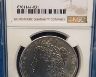 Lot 247. 1889 P Morgan silver dollar.  Graded MS 62 by NGC.