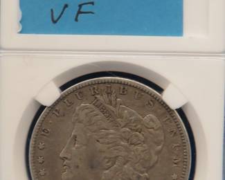 Lot 129. 1891 O Morgan silver dollar  VF