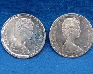 Lot 14. Two 1967 Canadian Goose silver dollars.  80% silver.