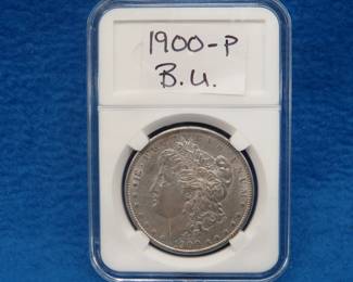 Lot 311. 1900 P Morgan silver dollar.  B.U.