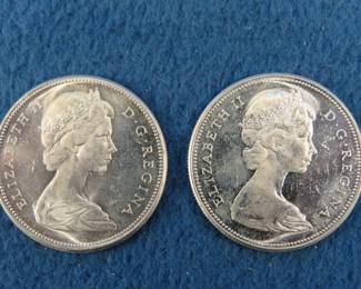 Lot 147. Two 1967 80% silver Canadian dollars