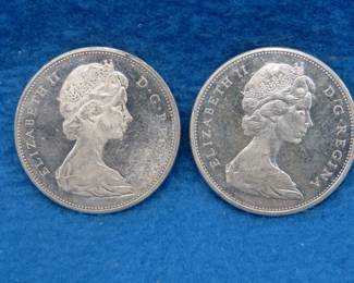 Lot 126. Two 1965 Canadian silver dollars