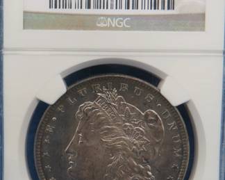 Lot 248. 1878 P Morgan silver dollar.  Eight tail feathers.  Graded MS 62 by NGC.