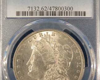 Lot 36. 1882 P Morgan Silver Dollar, graded MS-62 by PCGS