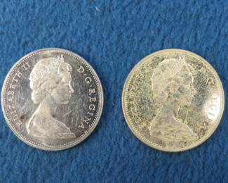 Lot 304. Two Canadian 80% silver dollars