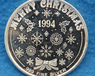 Lot 57. 1 ounce Silver art round