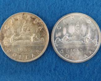 Lot 174. Two Canadian silver dollars.  1953 and 1965.