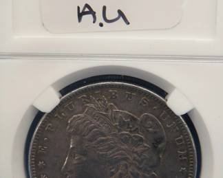 Lot 293. 1879 S/S Morgan silver dollar.  A.U.