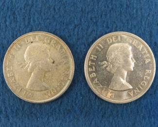 Lot 234. 1960 and 1961 Canadian silver dollars