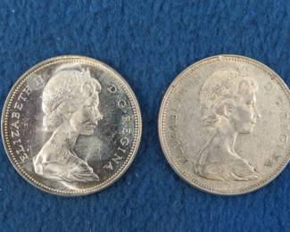 Lot 49. Two 80% Silver Canadian dollars