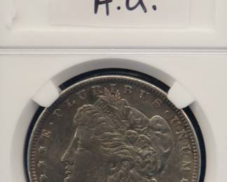 Lot 333. 1889 P Morgan silver dollar.  A.U.
