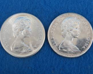 Lot 163. Two 1967 Canadian Centennial silver dollars