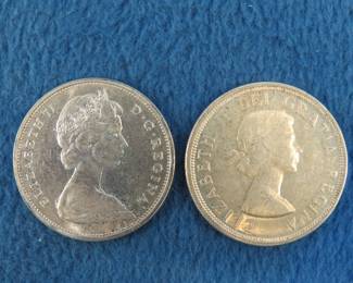 Lot 214. Two Canadian Silver Dollars