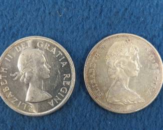 Lot 145. Two 80% silver Canadian dollars