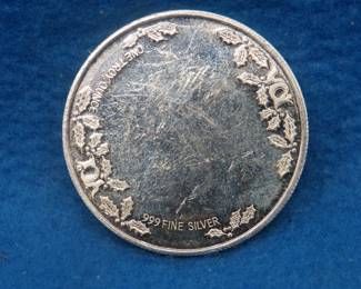 Lot 168. Noel silver coin.  One ounce of .999 fine silver