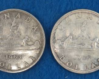 Lot 194. 1963 and 1965 Canadian silver dollars