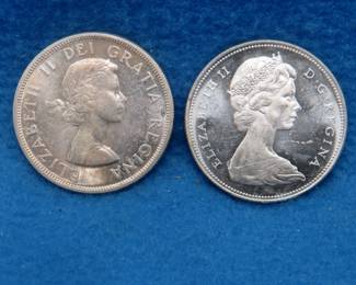 Lot 353. 1963 and 1965 Canadian silver dollars