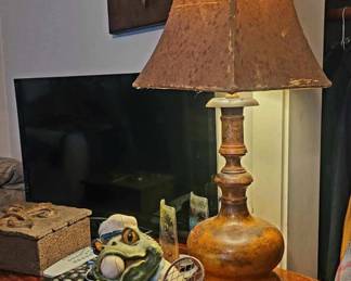 Lamp, Frog Figurine, Sanyo Television, Random Remote Controls 