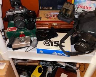 35mm Camera Minolta, Cigar Boxes, Sony Digital Camera, Disc Camera, Lumix Camera, binoculars,   35mm Film