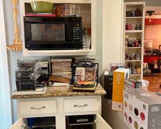 Microwave, cookbooks, pots pans