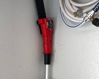 Electric Branch Trimmer ad above a boat or RV hose