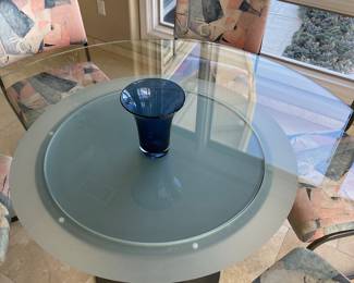 Fabulous modern dining table with a glass lazy Susan (!).