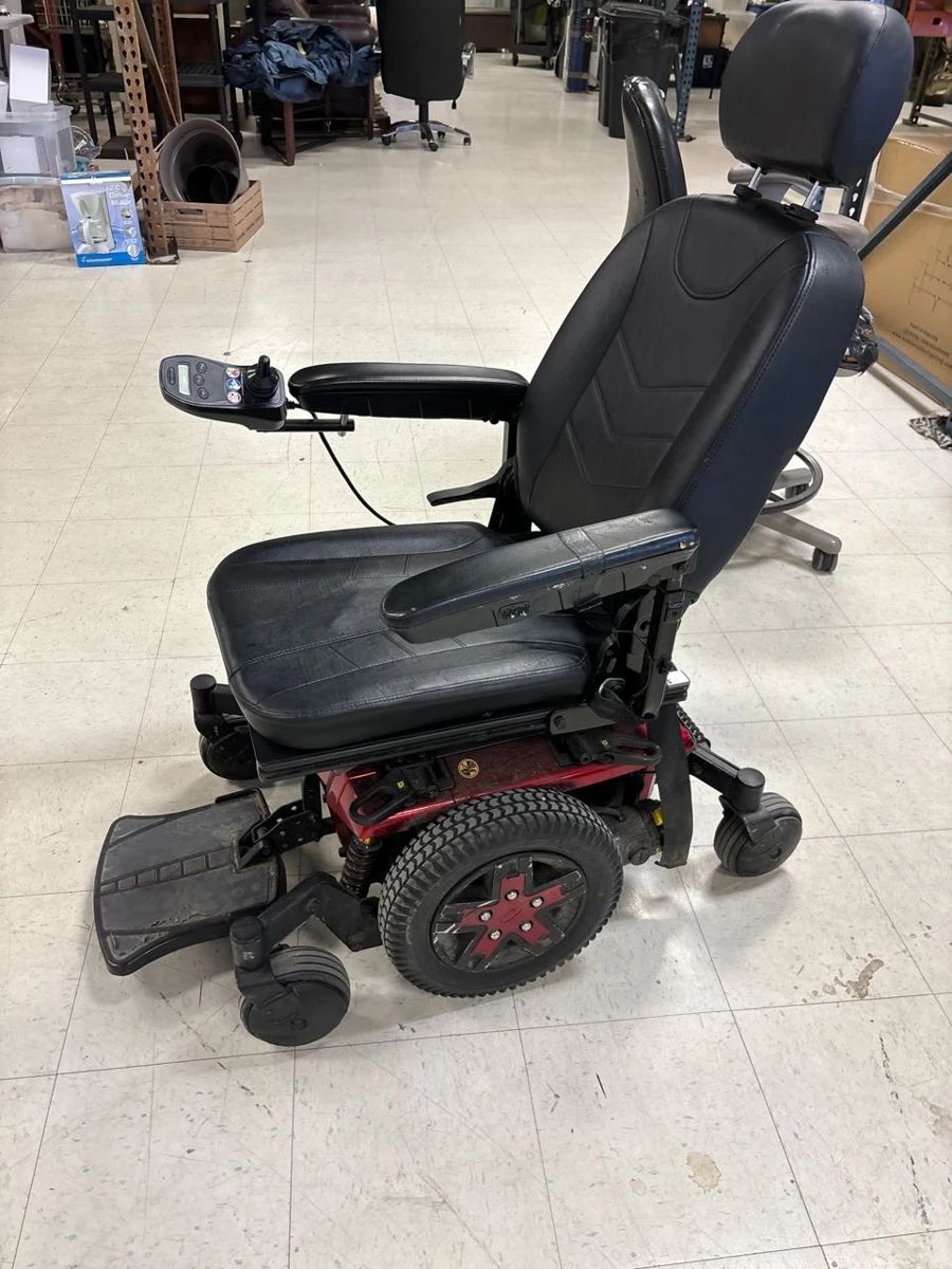 Quantum edge 3 powered wheelchair, still has charge, no charging chord.  all items in Online auction.
