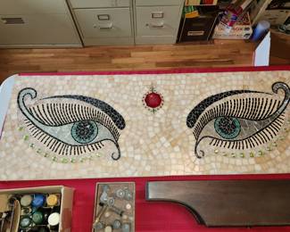 A fabulous tile piece about 4 feet by 2 feet. Heavy and wonderful. 