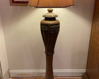 Resin Floor lamp with embossed palm tree.                62"t 12" diameter