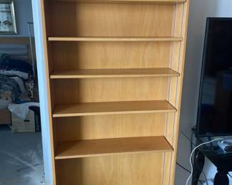 (2) Wooden book cases. 5 adjustable shelves. 49.25”w 17.75”d 30”t.    