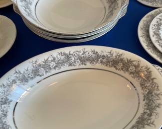 China “Florentine” by Sango Japan.               124 pieces: (16 each) dinner, salad, bread, soup, berry,  20 cups, 14 saucers, sugar, 2 creamer, 5 serving bowls, gray, platter.  $600.00