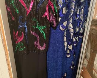 Women’s suits and beaded gowns! 
Size 12/14 Large/XL