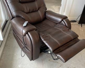 Moto Brown leather recliner and lift chair with hidden cup holders. 39"w 39"d 43"t, 60"t up on lift 