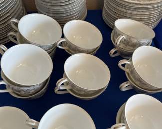 China “Florentine” by Sango Japan.               124 pieces: (16 each) dinner, salad, bread, soup, berry,  20 cups, 14 saucers, sugar, 2 creamer, 5 serving bowls, gray, platter.  $600.00