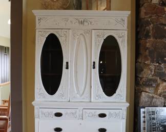 White classic farmhouse chic cabinet with lovely carved wood details