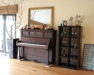 Antique Piano, Open Shelving Bookcase, large ceramic plant container, and decorative items