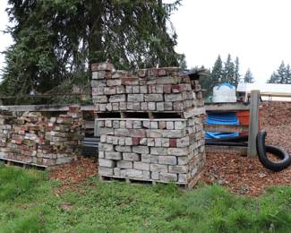 Pallets of bricks and other construction materials